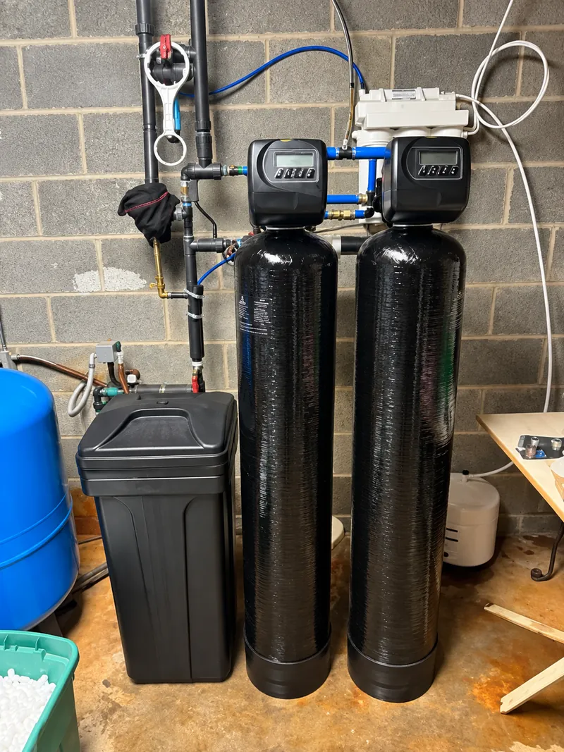 Dual-tank well system and reverse osmosis, basement install