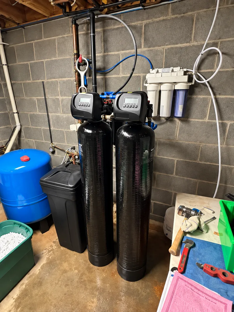Dual-tank well system with sediment filters